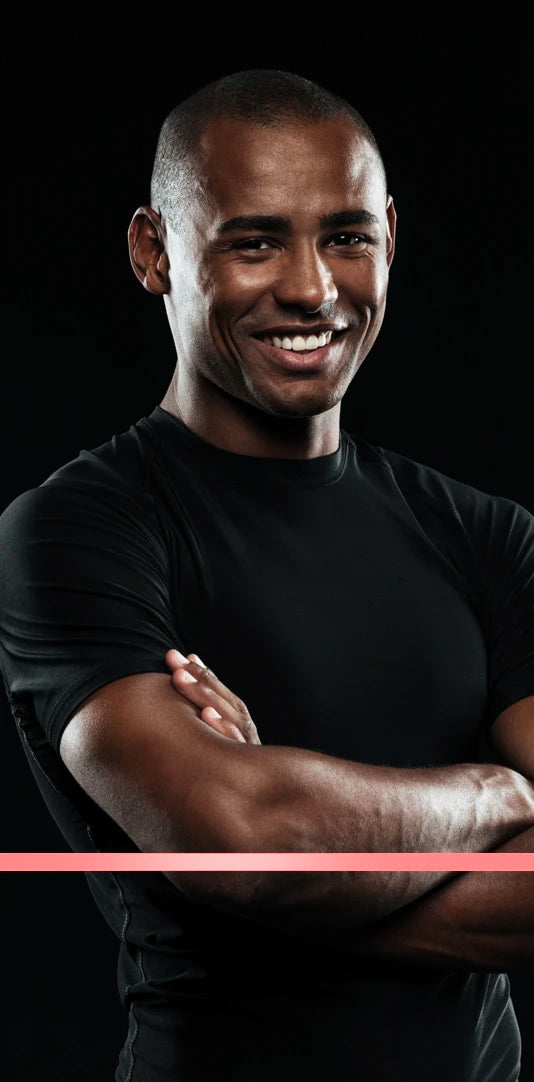 Athletic man with confident posture representing daily performance, wellness, and healthy lifestyle aligned with Premier Line nutrition
